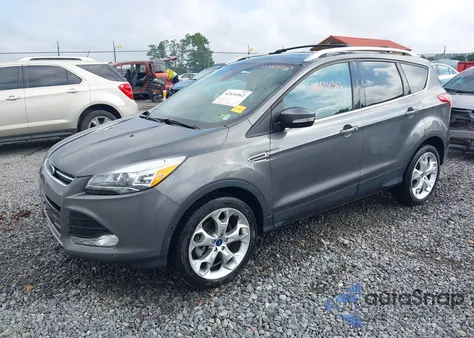 2013 Ford Escape Titanium z USA, uszkodzony, nr VIN 1FMCU9J96DUD84900